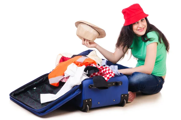 Ragazza che fa i bagagli per le vacanze — Foto Stock