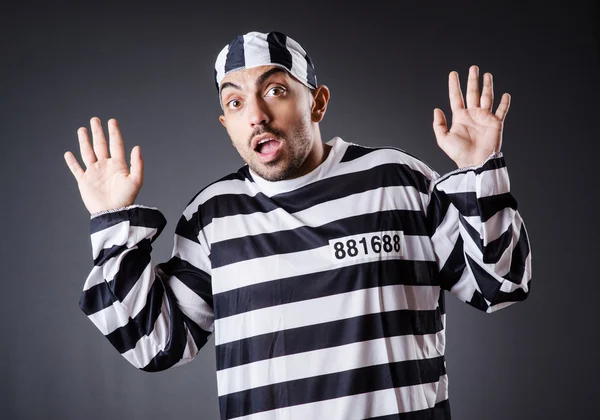 Convict criminal in striped uniform — Stock Photo, Image