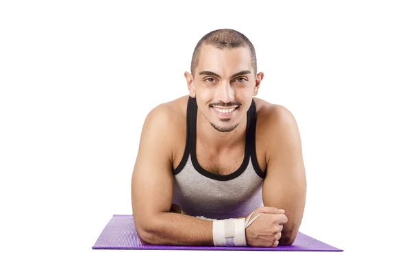 Homem fazendo exercícios em branco — Fotografia de Stock