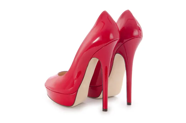 Üzerinde beyaz izole kırmızı şık kadın ayakkabı — Stok fotoğraf