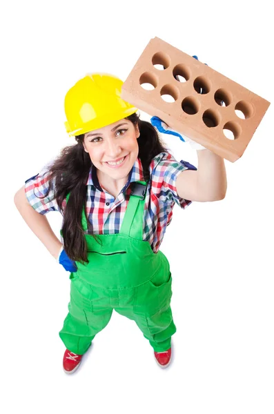 Mujer constructora con ladrillos en blanco — Foto de Stock