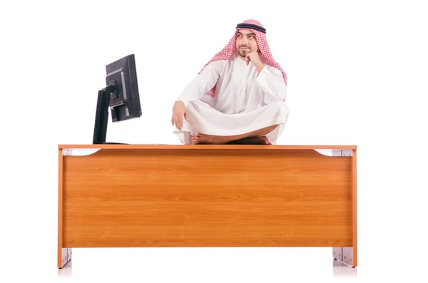 Homem árabe sentado em sua mesa — Fotografia de Stock