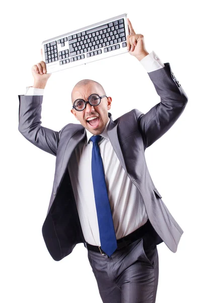 Nerd-Geschäftsmann mit Computertastatur auf Weiß — Stockfoto