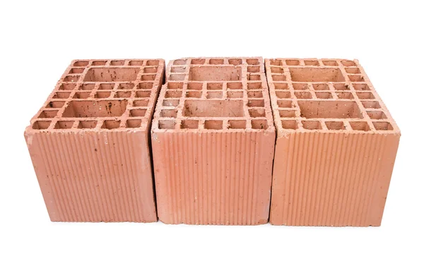 Stack of clay bricks isolated on white — Stock Photo, Image