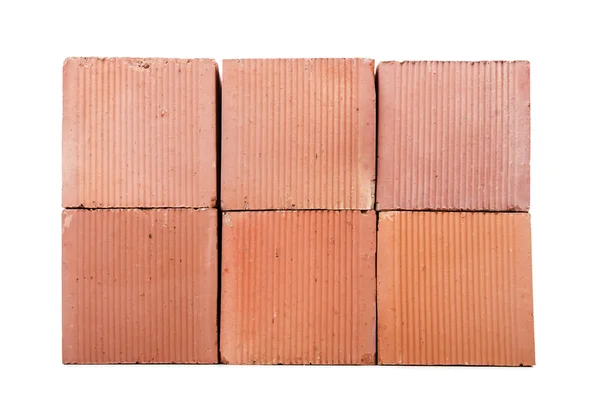 Stack of clay bricks isolated on white — Stock Photo, Image