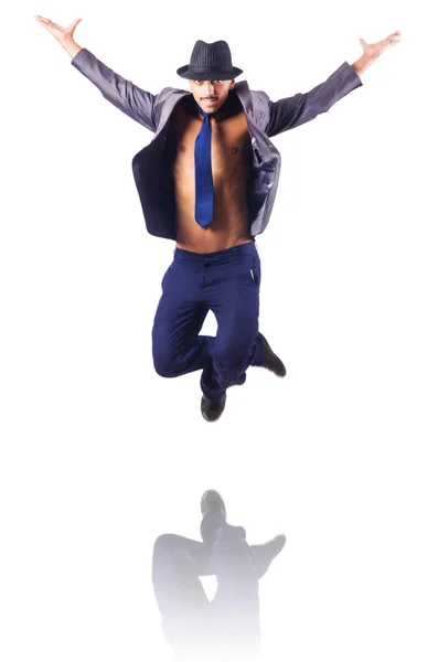 Muscular half naked businessman jumping on white — Stock Photo, Image