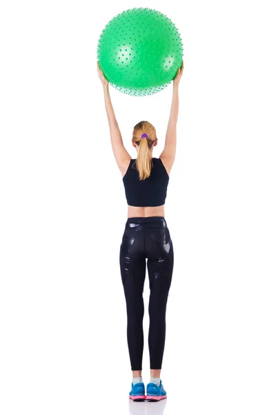 Ung flicka med schweizisk boll gör övning — Stockfoto