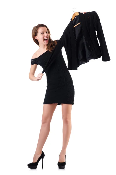 Mujer joven probando ropa nueva en blanco —  Fotos de Stock