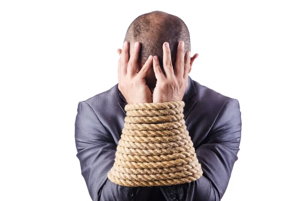 Businessman tied up with rope — Stock Photo, Image