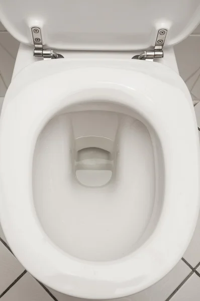 Toilet in the bathroom Stock Picture