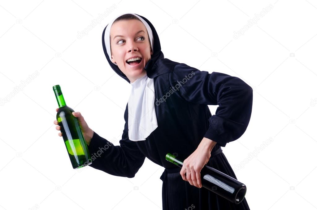 Nun with bottle of red wine