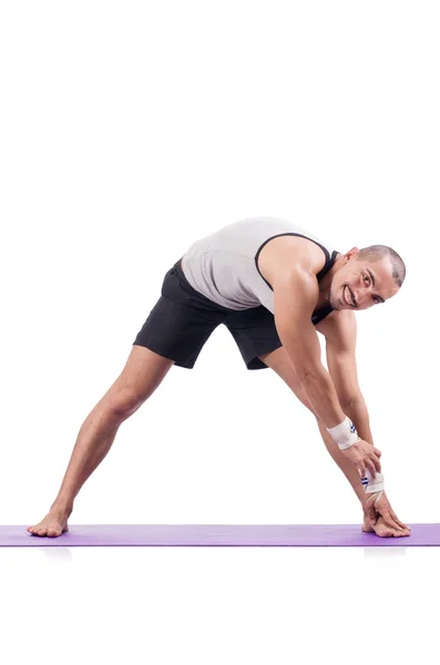Hombre haciendo ejercicios en blanco —  Fotos de Stock