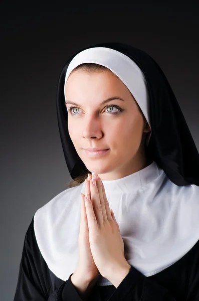 Young nun in religious concept — Stock Photo, Image