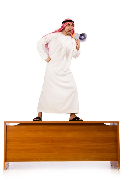 Arab man sitting at his desk Stock Image