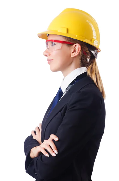 Young businesswoman with hard hat on white Stock Photo