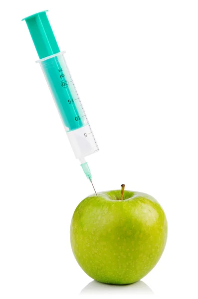 Experiment with apple and syringes — Stock Photo, Image