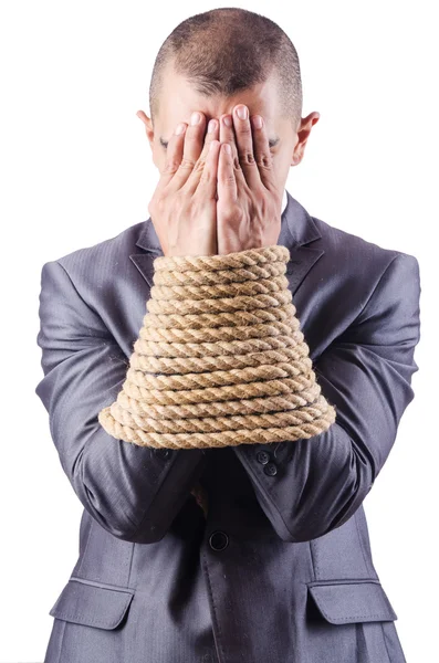 Businessman tied up with rope — Stock Photo, Image