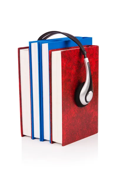 Concept of audio books with earphones on white — Stock Photo, Image