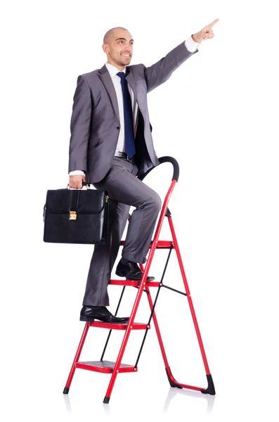 Бизнесмен с лестницей изолирован на белом — стоковое фото
