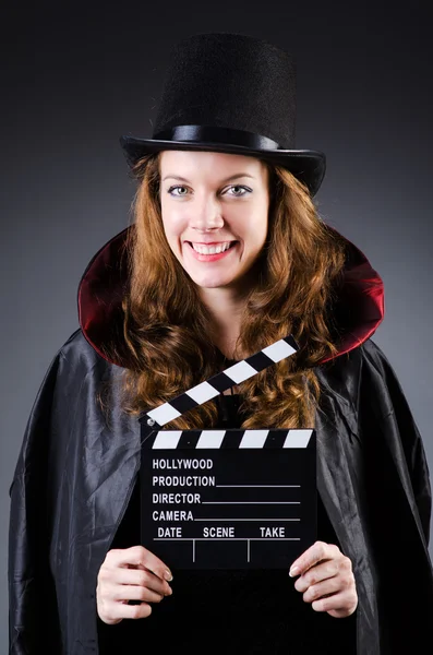 Woman with movie clapper board — Stock Photo, Image