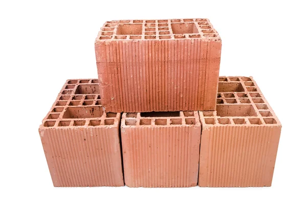 Stack of clay bricks isolated on white — Stock Photo, Image