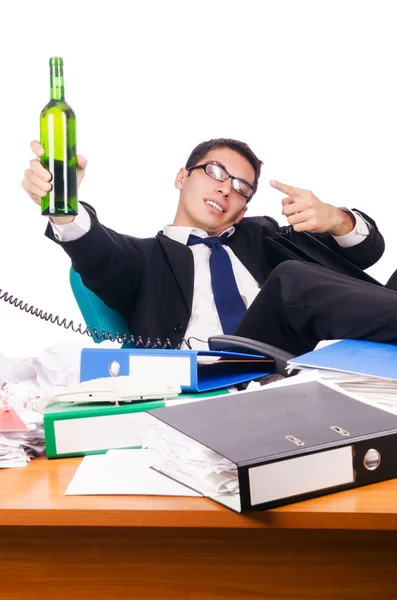 Young busy businessman at his desk — Stock Photo, Image