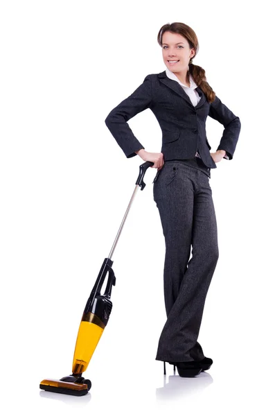 Jeune femme avec aspirateur sur blanc — Photo