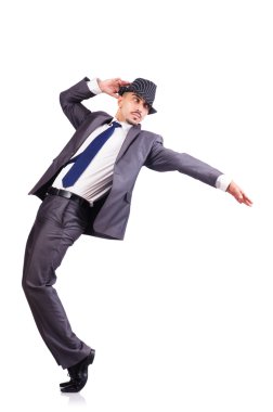 Dansçı iş adamı beyazlar içinde.