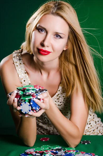 Woman in casino playing cards — Stock Photo, Image