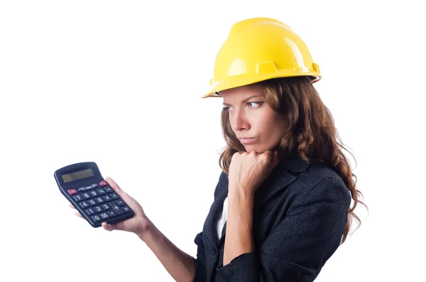 Female builder with calculator on white — Stock Photo, Image