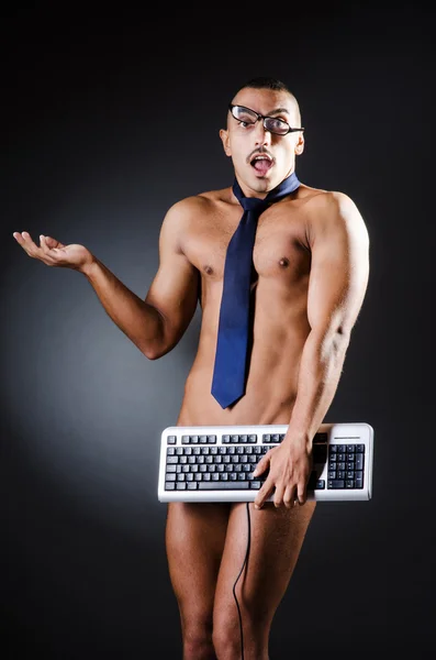 Empresario en pantalones con teclado —  Fotos de Stock