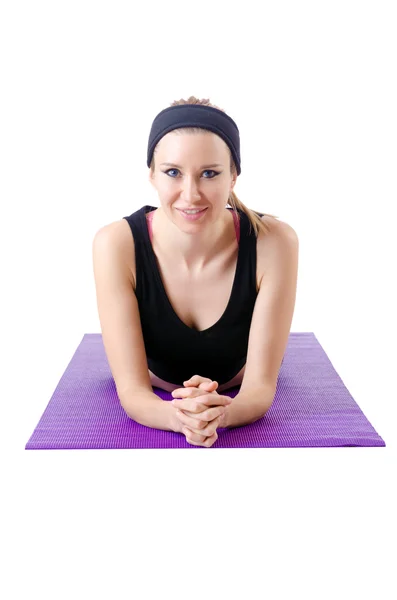 Young female doing exercises on white — Stock Photo, Image