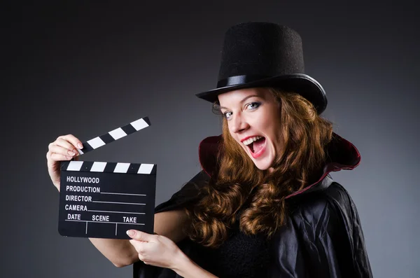 Mulher com placa de filme palmas — Fotografia de Stock