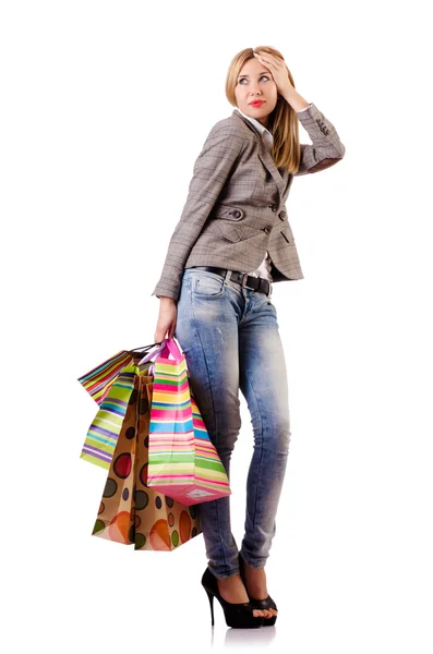 Mulher atraente depois de compras de Natal no branco — Fotografia de Stock