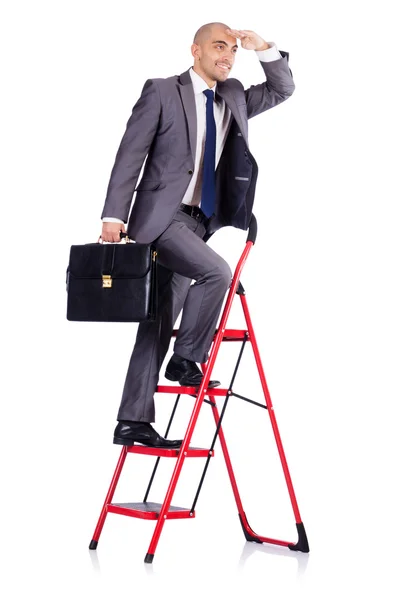 Businessman with the ladder isolated on white — Stock Photo, Image