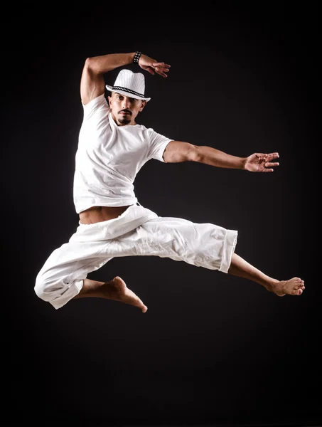 Dancer dancing dances in white clothing — Stock Photo, Image