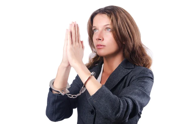 Femme d'affaires avec menottes sur blanc — Photo