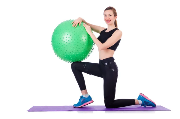 Mujer haciendo ejercicios con pelota en blanco —  Fotos de Stock