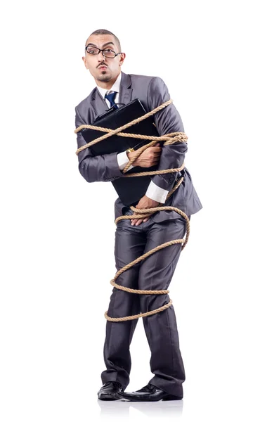 Businessman tied up with rope — Stock Photo, Image