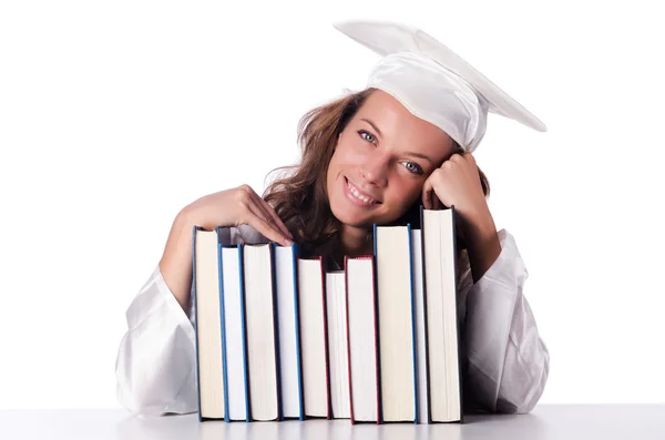 Examen med bok isolerad på vit — Stockfoto