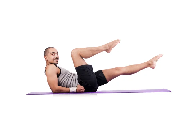 Man doing exercises on white — Stock Photo, Image