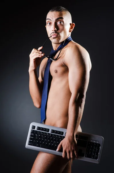 Businessman in pants with keyboard — Stock Photo, Image