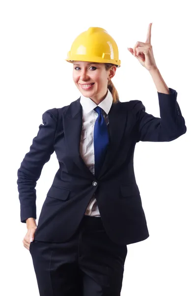 Young businesswoman with hard hat on white Royalty Free Stock Photos