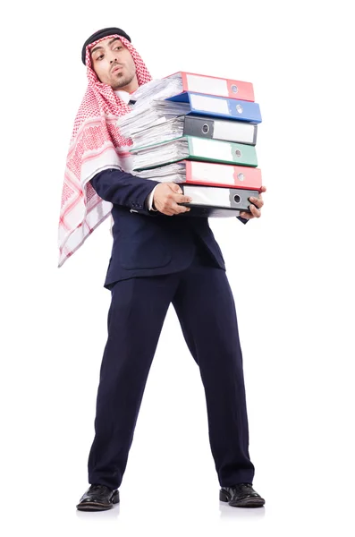 Uomo d'affari arabo con molte cartelle su bianco — Foto Stock