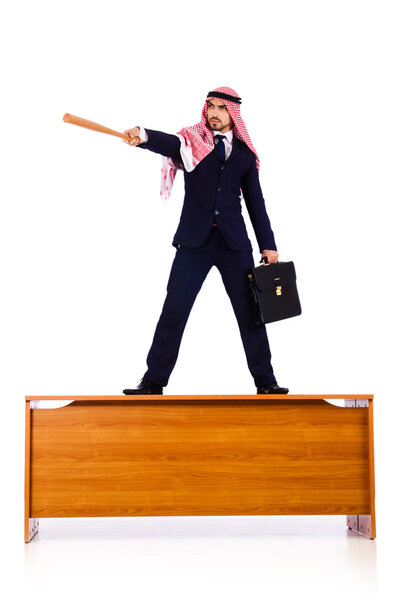 Arab businessman hitting with baseball bat