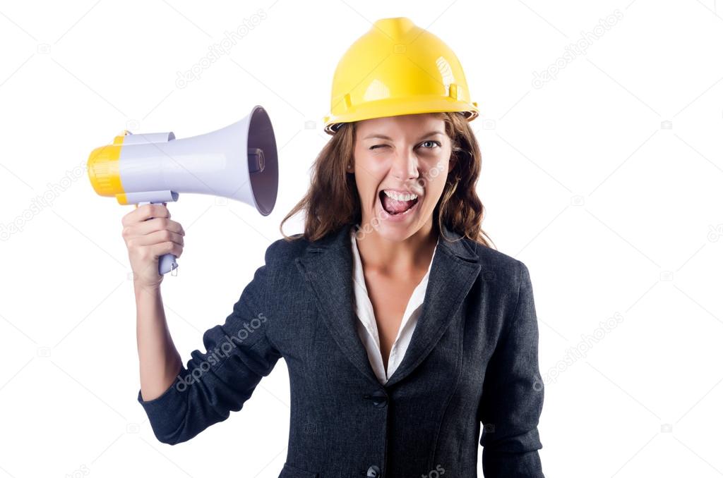 Female construction worker with loudspeaker