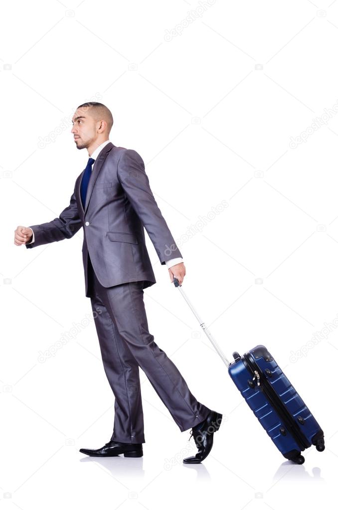 Businessman with luggage on white