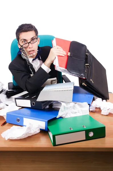 Jovem empresário ocupado em sua mesa — Fotografia de Stock