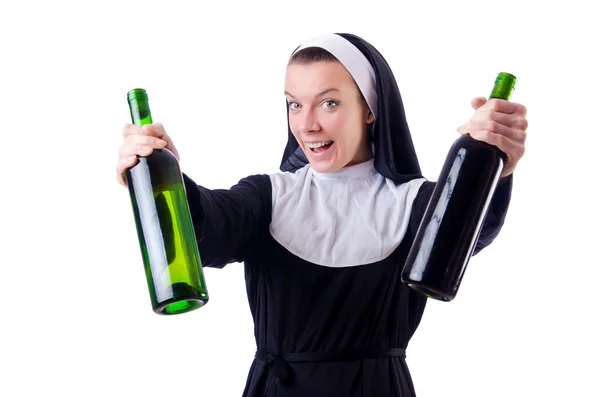 Monja con botella de vino tinto — Foto de Stock