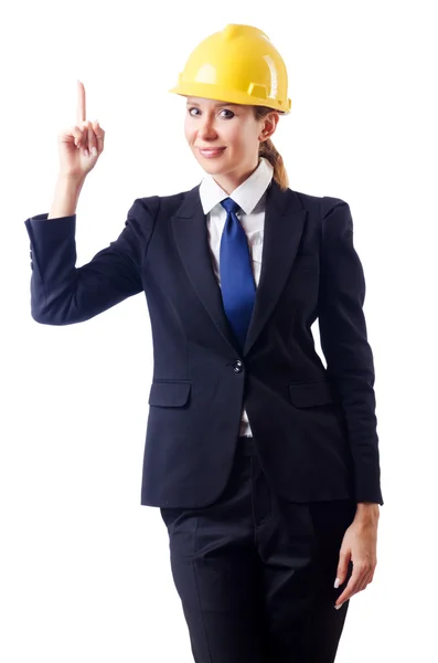 Jeune femme d'affaires avec casque dur sur blanc — Photo